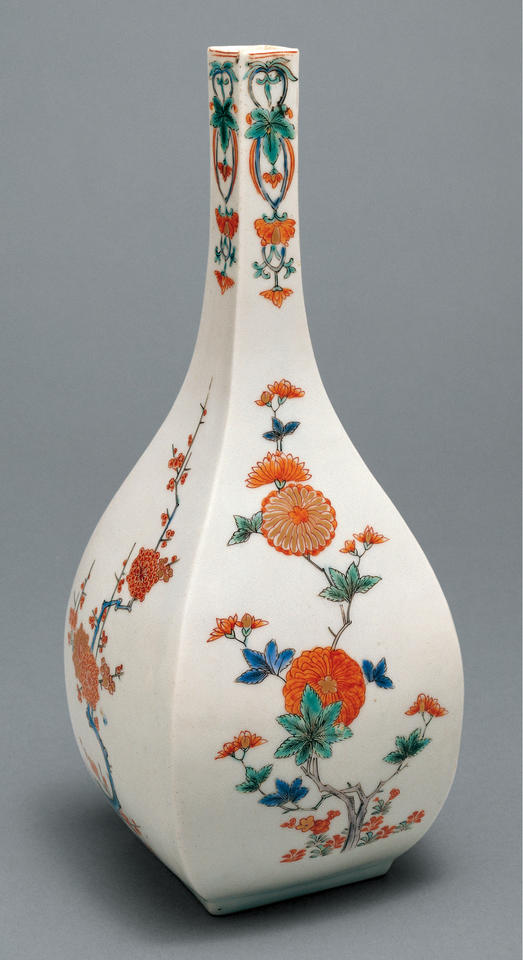 Bottle with chrysanthemums and plums