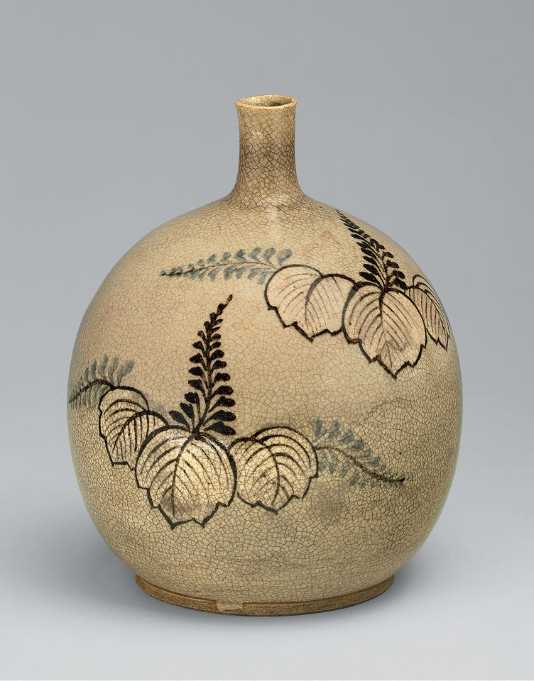 Sake bottle with paulownia