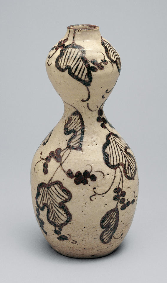 Sake flask with grapevines