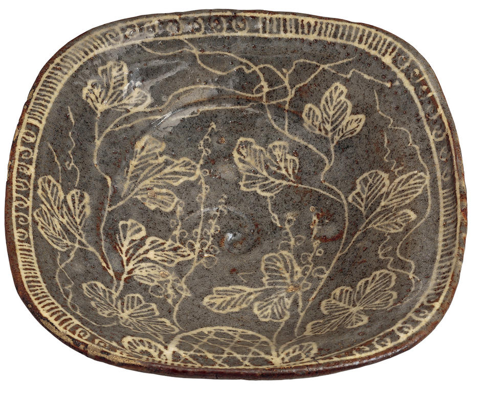 Plate with grapevines, trellis, and geometric design