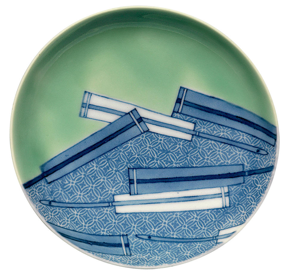 Plate with fans and geometric design