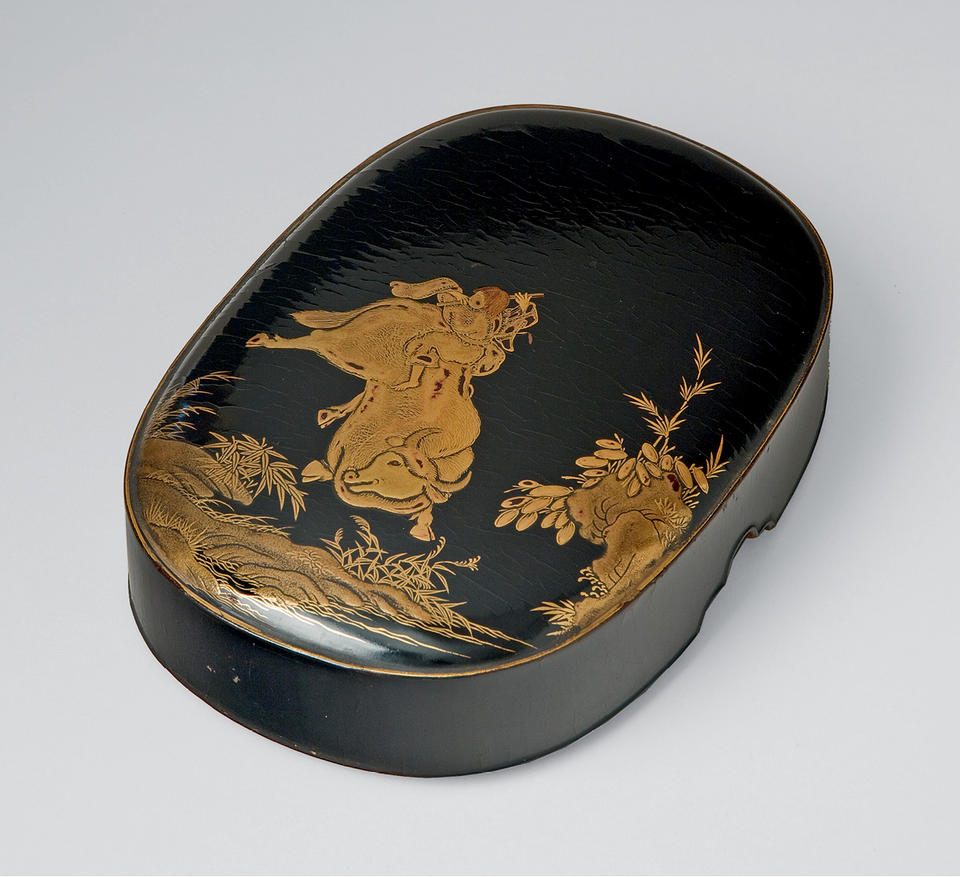 Box with herdboy on an ox