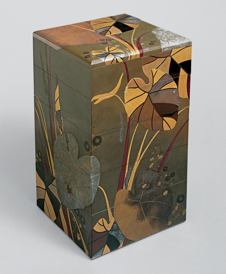 Stacked food boxes (jūbako, 重箱) with taro plants and chrysanthemums
