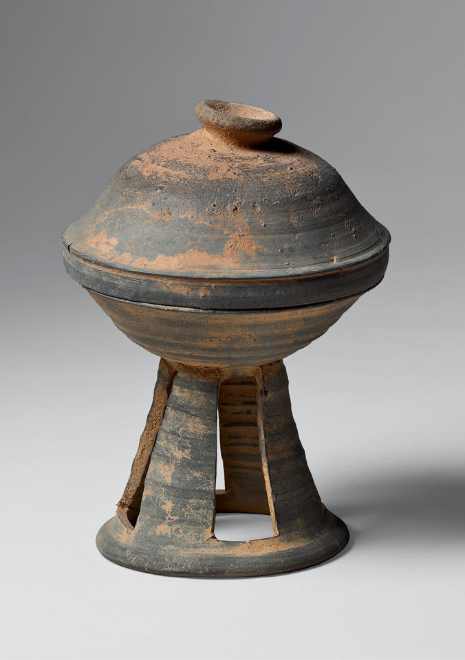 Lidded dish with tall, perforated base