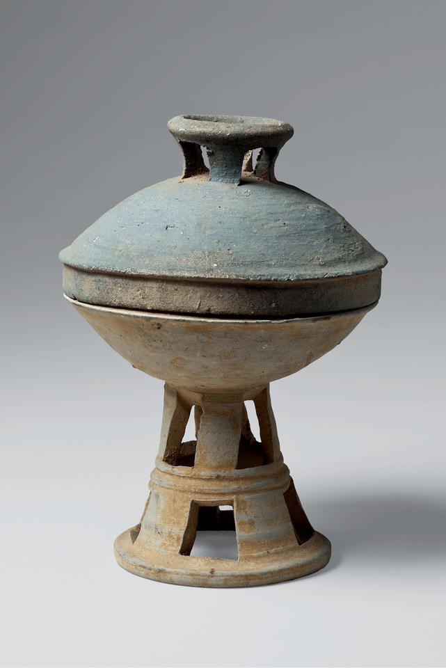 Lidded dish with tall, perforated base
