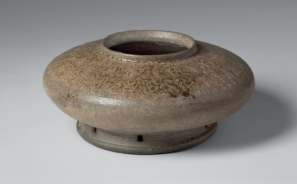 Small jar with perforated base