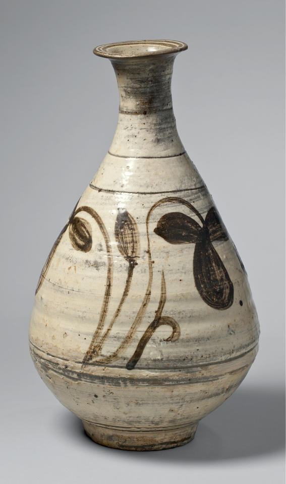 Bottle with floral design