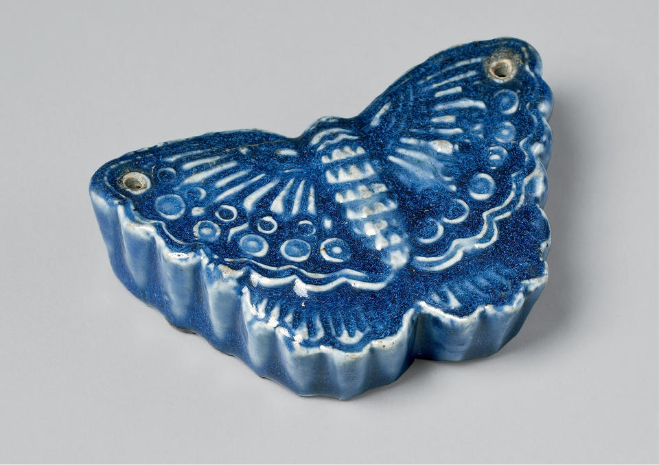 Water dropper in the shape of a butterfly