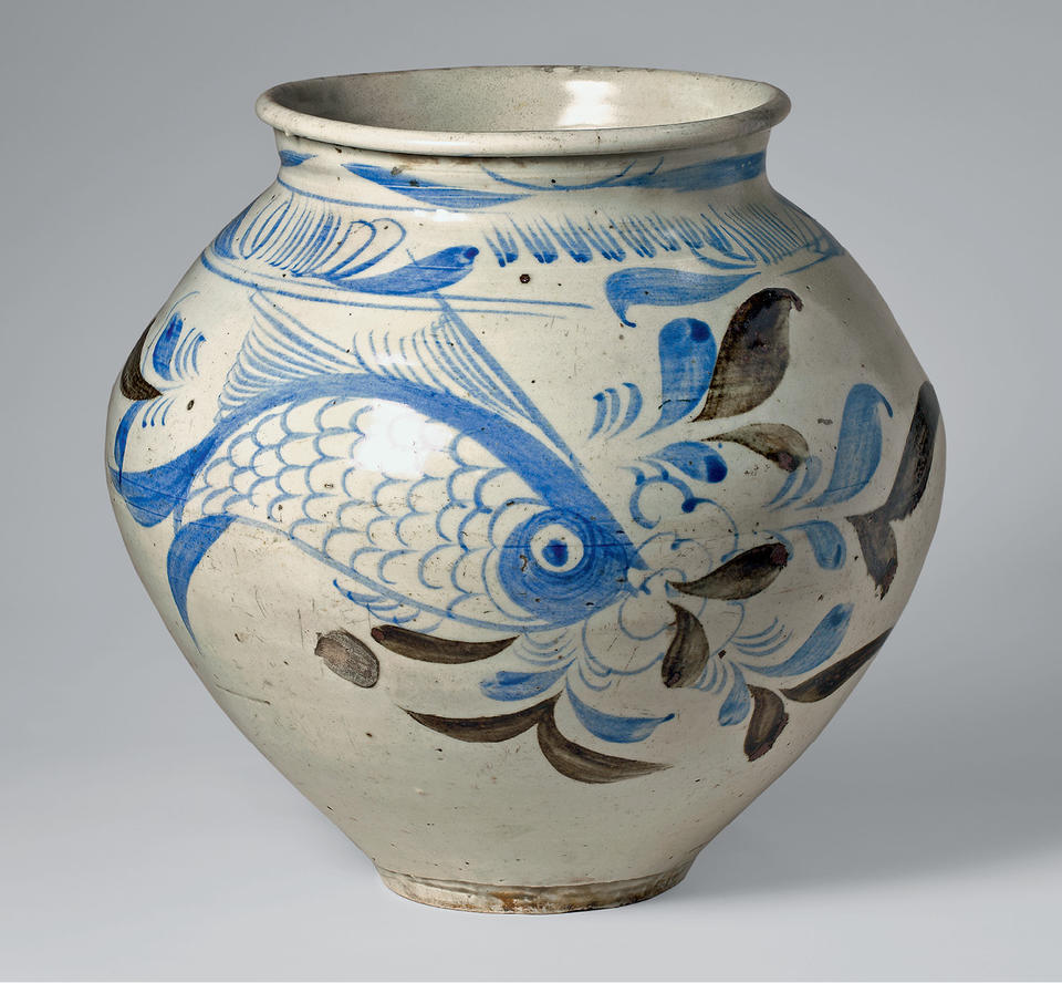Jar with fish and plants